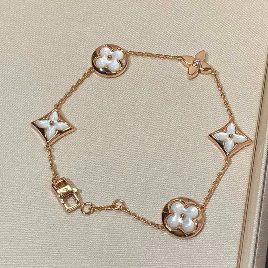 [Select]STAR AND SUN 5 MOTIF MOP PINK GOLD BRACELET