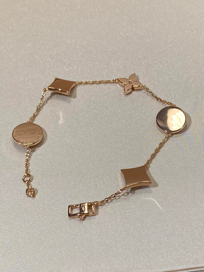 [Select]STAR AND SUN 5 MOTIF MOP PINK GOLD BRACELET