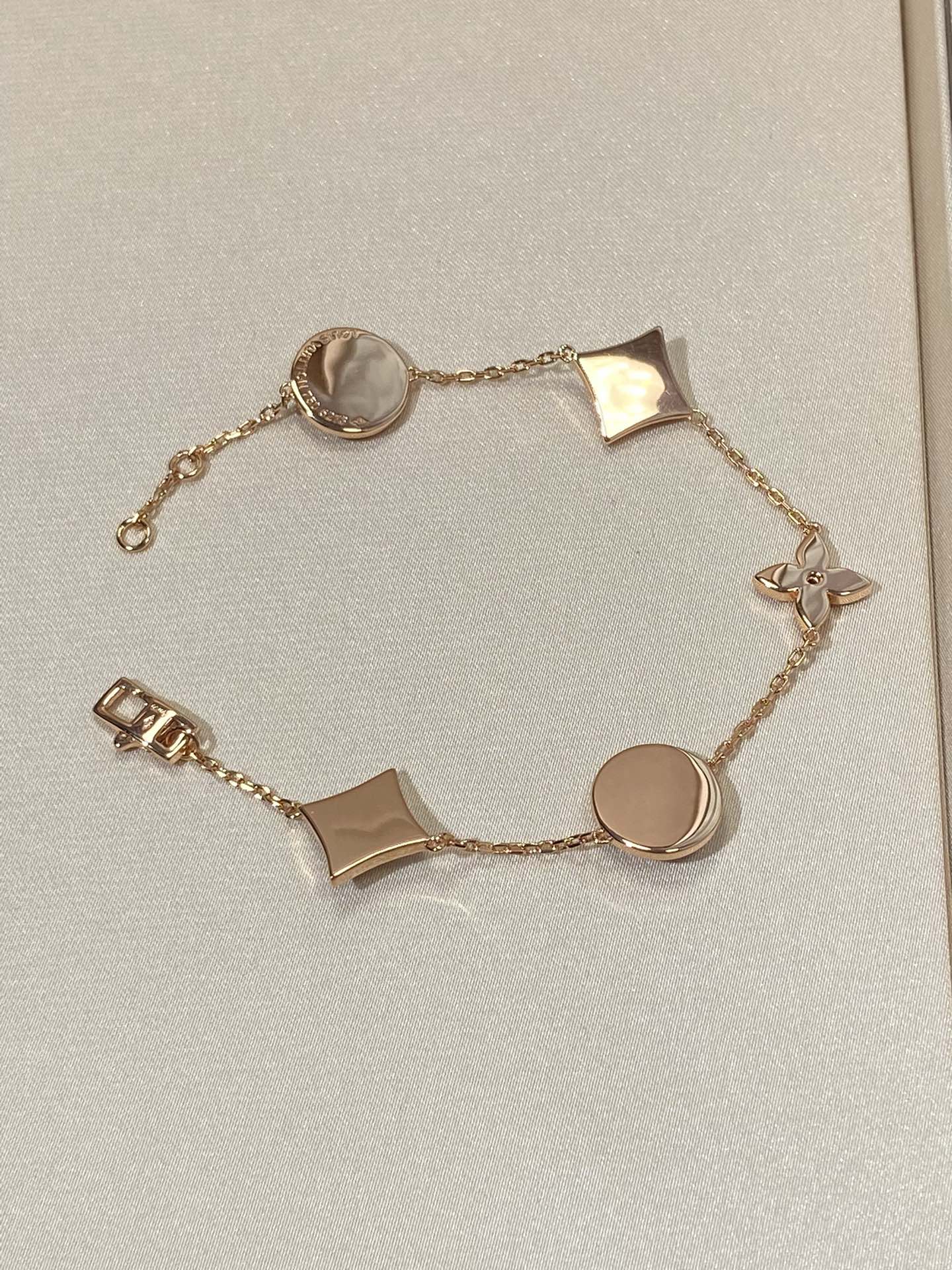 [Select]STAR AND SUN 5 MOTIF MOP PINK GOLD BRACELET