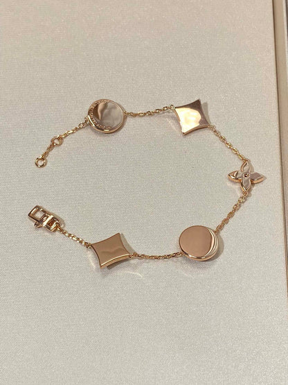 [Select]STAR AND SUN 5 MOTIF MOP PINK GOLD BRACELET