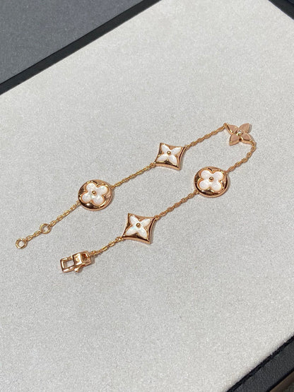 [Select]STAR AND SUN 5 MOTIF MOP PINK GOLD BRACELET